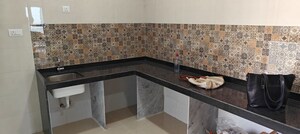 Kitchen in 4 BHK Apartment at Raj Infinia, Malad West – for Rent