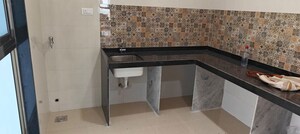 Kitchen in 4 BHK Apartment at Raj Infinia, Malad West – for Rent