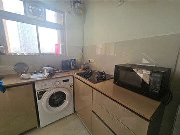Kitchen in 1 BHK Apartment at Hiranandani Estate Solitaire C, Ghodbunder Road – for Rent