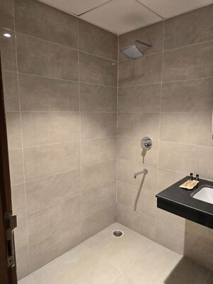 Bathroom in Studio Apartment at Omaxe Hazratganj, Gomti Nagar – for Rent