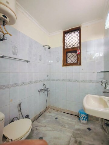 Bathroom in 3 BHK Builder Floor at RWA Residential Society Sector 46, Sector 46 – for Rent