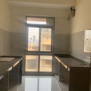 Kitchen in 2 BHK Apartment at Rander Komal Kounteya CHS, Prerna Nagar – for Sale