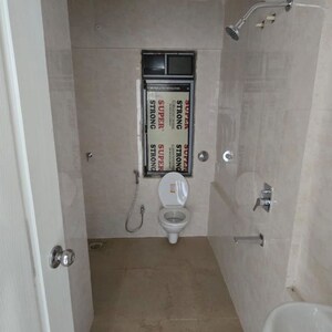 Bathroom in 1 BHK Apartment at BG Shirke Monte Verita East Tower, Trimurty Nagar – for Sale