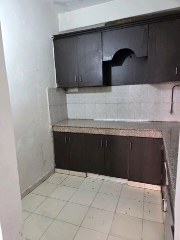 Kitchen in 2 BHK Apartment at Mahagun Mahagunpuram, Shastri Nagar – for Rent