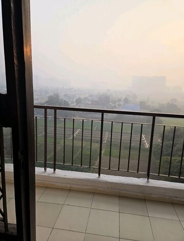 Balcony in 2 BHK Apartment at Mahagun Mahagunpuram, Shastri Nagar – for Rent