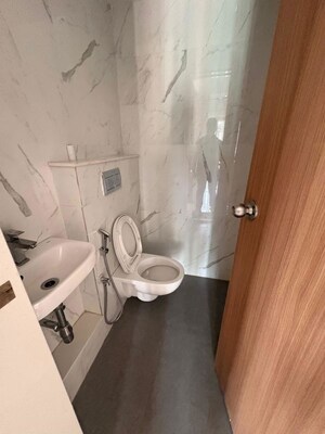 Bathroom in 1 BHK Apartment at Lodha Codename Premier, Dombivli East – for Rent