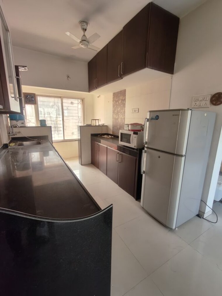 Kitchen, royale-rahadki-greens-phase-2 1 Bedroom 580 Sq.Ft. Apartment In Pimple Saudagar Pune 10002177