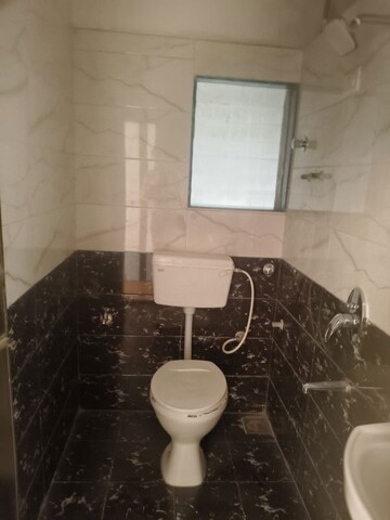 Bathroom in 2 BHK Apartment at Ajmera Yogi Dham Phase III, Kalyan West – for Rent