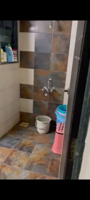 Bathroom in 1 BHK Apartment at Mangeshi Sahara, Kalyan West – for Rent