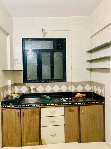 Kitchen in 2 BHK Apartment at Dedhia Golden Park II, Kalyan West – for Rent