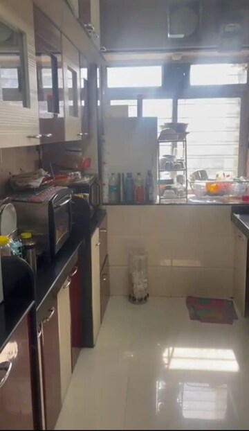 Kitchen in 2 BHK Apartment at Kalpa Taru Siddhachal III, Vasant Vihar – for Rent