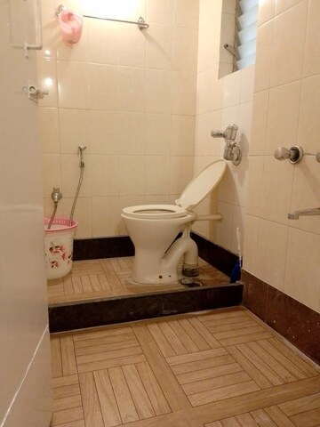Bathroom in 2 BHK Apartment at Kalpa Taru Siddhachal III, Vasant Vihar – for Rent