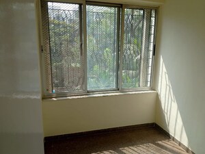 Room in 2 BHK Apartment at Kalpa Taru Siddhachal III, Vasant Vihar – for Rent