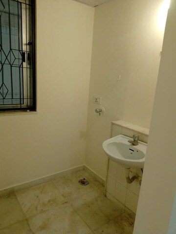 Bathroom in 2 BHK Apartment at Kalpa Taru Siddhachal III, Vasant Vihar – for Rent