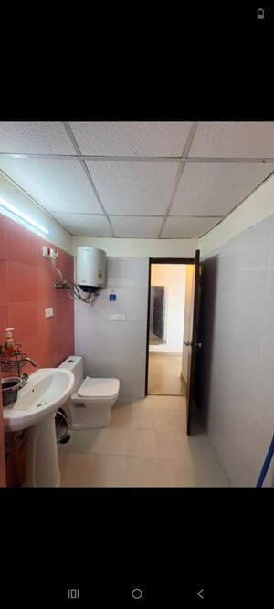 Bathroom in 4 BHK Apartment at Aims Golf City, Sector 75 – for Rent