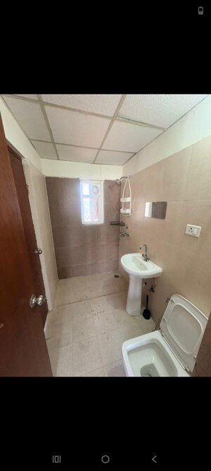 Bathroom in 4 BHK Apartment at Aims Golf City, Sector 75 – for Rent