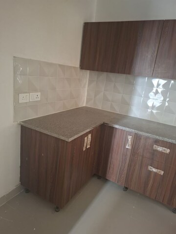 Kitchen in 2.5 BHK Apartment at RG Luxury Homes, Sector 16b Greater Noida – for Rent