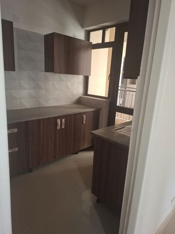 Kitchen in 2.5 BHK Apartment at RG Luxury Homes, Sector 16b Greater Noida – for Rent