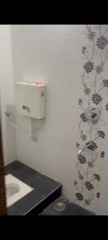 Bathroom in 2 BHK Apartment at Aastha River View, Taloja – for Rent