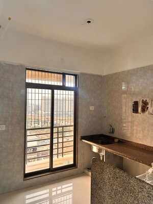 Kitchen in 2 BHK Apartment at Aastha River View, Taloja – for Rent