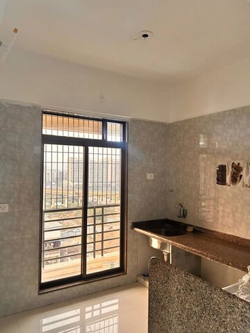 Kitchen in 2 BHK Apartment at Aastha River View, Taloja – for Rent