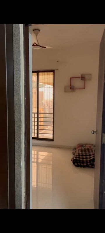 Bedroom in 2 BHK Apartment at Aastha River View, Taloja – for Rent