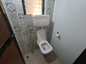 Bathroom in 1 BHK Apartment at Raunak Bliss, Ghodbunder Road – for Rent