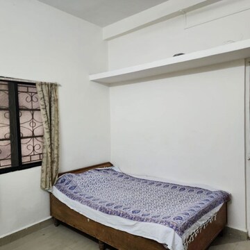 Bedroom in 1 BHK Apartment at Wadgaon Sheri – for Rent