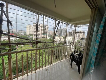 Balcony in 2 BHK Apartment at Express Apartment, Yari Road – for Sale