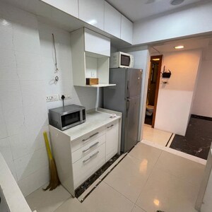 Team Area in 2 BHK Apartment at Pearl Heights, Yari Road – for Rent