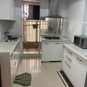 Kitchen in 2 BHK Apartment at Pearl Heights, Yari Road – for Rent