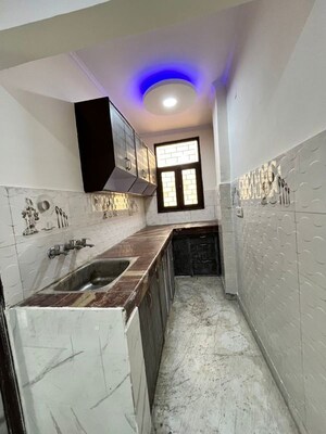 Kitchen in 1.5 BHK Builder Floor at Uttam Nagar – for Sale