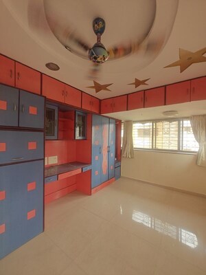 Living Room in 2 BHK Apartment at Badri Kedar Building, Seawoods Sector 40 – for Rent