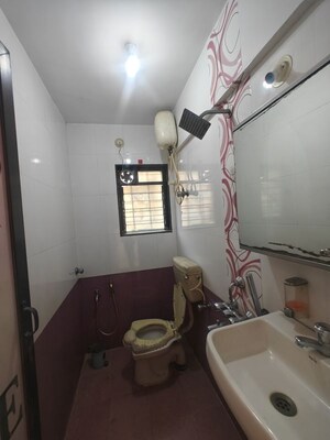 Team Area in 2 BHK Apartment at Badri Kedar Building, Seawoods Sector 40 – for Rent