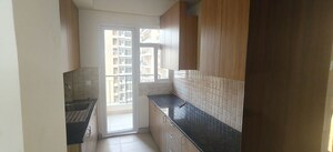 Kitchen in 3 BHK Apartment at Amrapali Crystal Homes, Sector 76 – for Rent