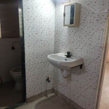 Attached Bathroom in 1 BHK Apartment at Janki Kutir, Bangur Nagar – for Sale