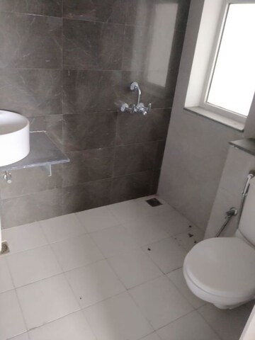 Bathroom in 3 BHK Apartment at Sushma Crescent, Dhakoli – for Rent