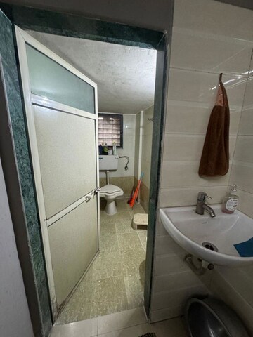 Bathroom in 2 BHK Apartment at Seawoods Sector 44 – for Rent