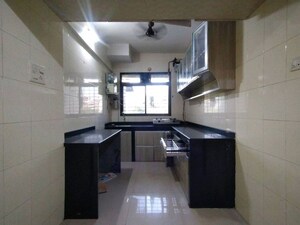 Kitchen in 2 BHK Apartment at NRI Complex Phase I, Seawoods Sector 58 – for Rent