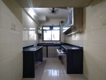 Kitchen in 2 BHK Apartment at NRI Complex Phase I, Seawoods Sector 58 – for Rent