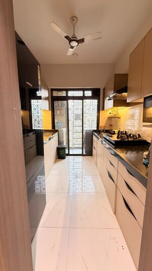 Kitchen in 1.5 BHK Apartment at Dosti West County, Balkum Pada – for Rent