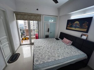 Bedroom in 2 BHK Apartment at Mahagun Moderne, Sector 78 – for Rent