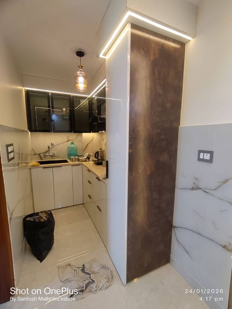 Kitchen, dwarka mor 3 Bedroom 95 Sq.Yd. Builder Floor In Dwarka Mor Delhi 9963043