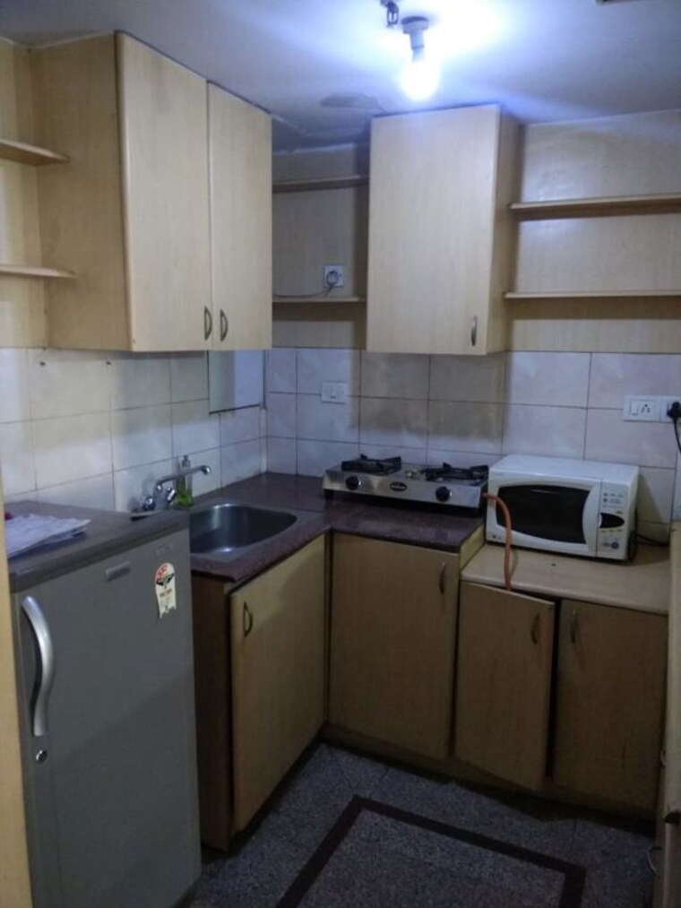Kitchen, ansal-celebrity-suites 1 Bedroom 700 Sq.Ft. Apartment In Sector 2 Gurgaon 10003080