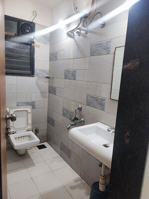 Bathroom in 2 BHK Apartment at Concord Pushpak, Lohgaon – for Rent