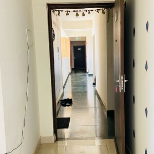 Building Lobby in 2 BHK Apartment at Signature Orchard Avenue 2, Hayatpur – for Rent