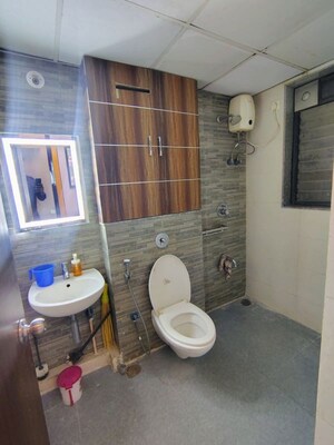Bathroom in 1.5 BHK Apartment at Lodha Palava City, Dombivli East – for Rent