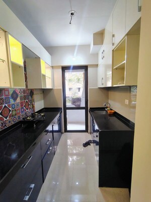 Kitchen in 1.5 BHK Apartment at Lodha Palava City, Dombivli East – for Rent