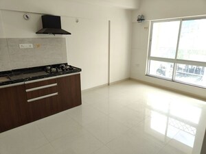 Kitchen in Studio Apartment at Gera World of Joy, Kharadi – for Rent