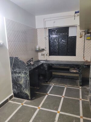 Kitchen in 1 BHK Apartment at Omkar Eknath Heights, Kalyan East – for Sale